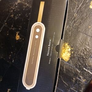 Vacuum Sealer with Gold Accents